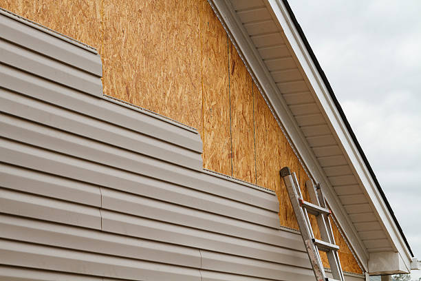 Professional Siding Repair technician working in Cowansville, PA